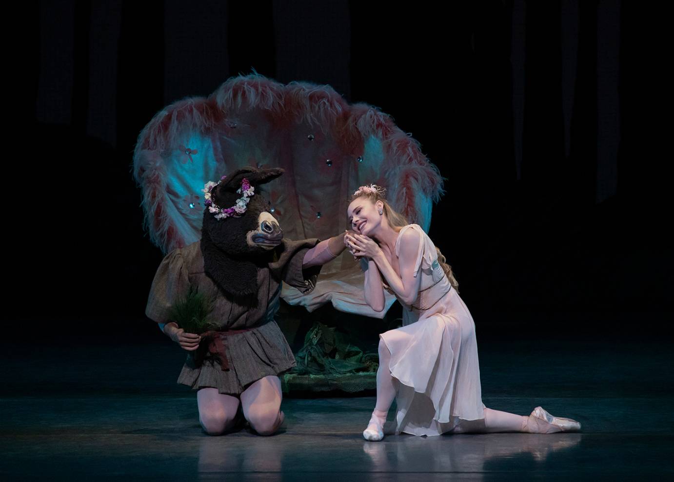 Preston Chamblee and Sara Mearns kneel, acting like they're in love